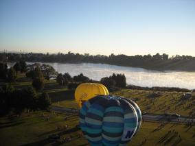 Balloon Rising Up With The Sun