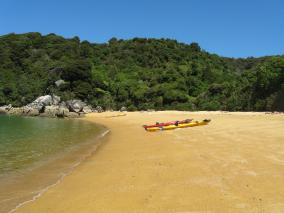 Kayaks on Abel Tasman Beach